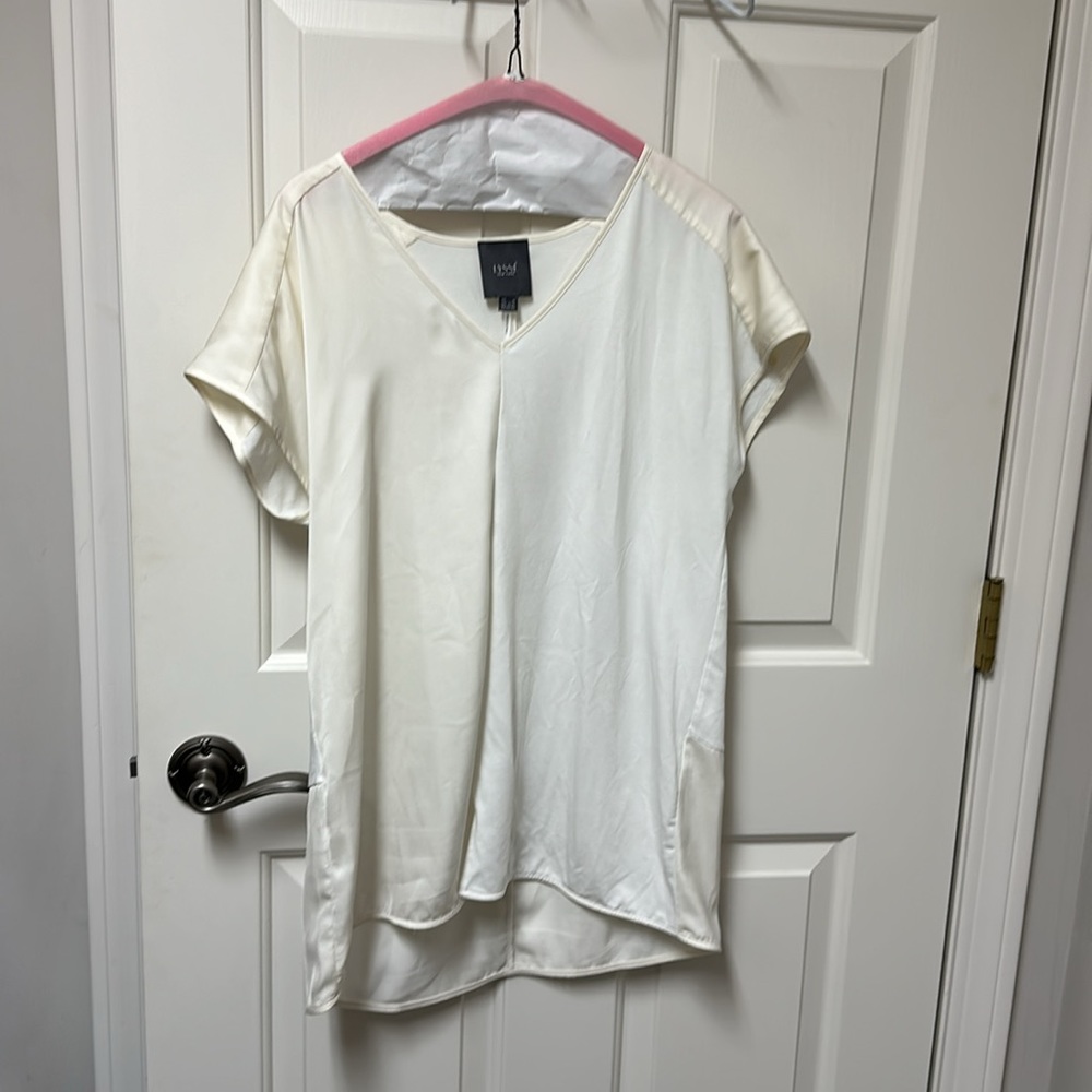 Brand: Lyssé New York off white blouse. Size: Medium
